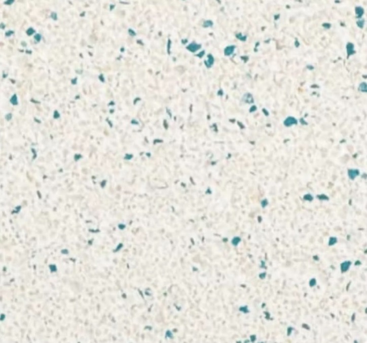 Cayman Green Splash pool plaster finish sample showing its aggregate color and texture